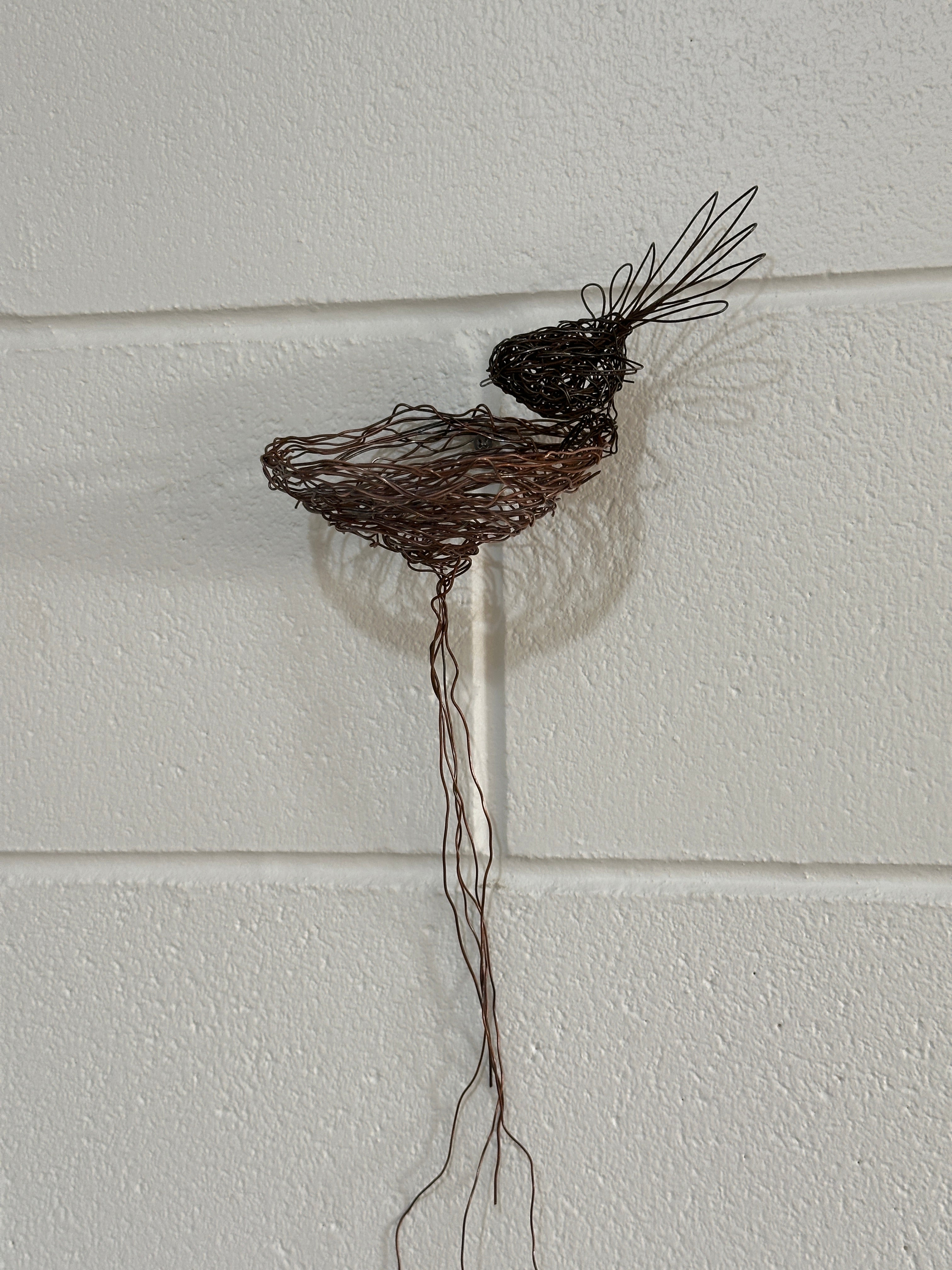Fantail and nest wall sculpture