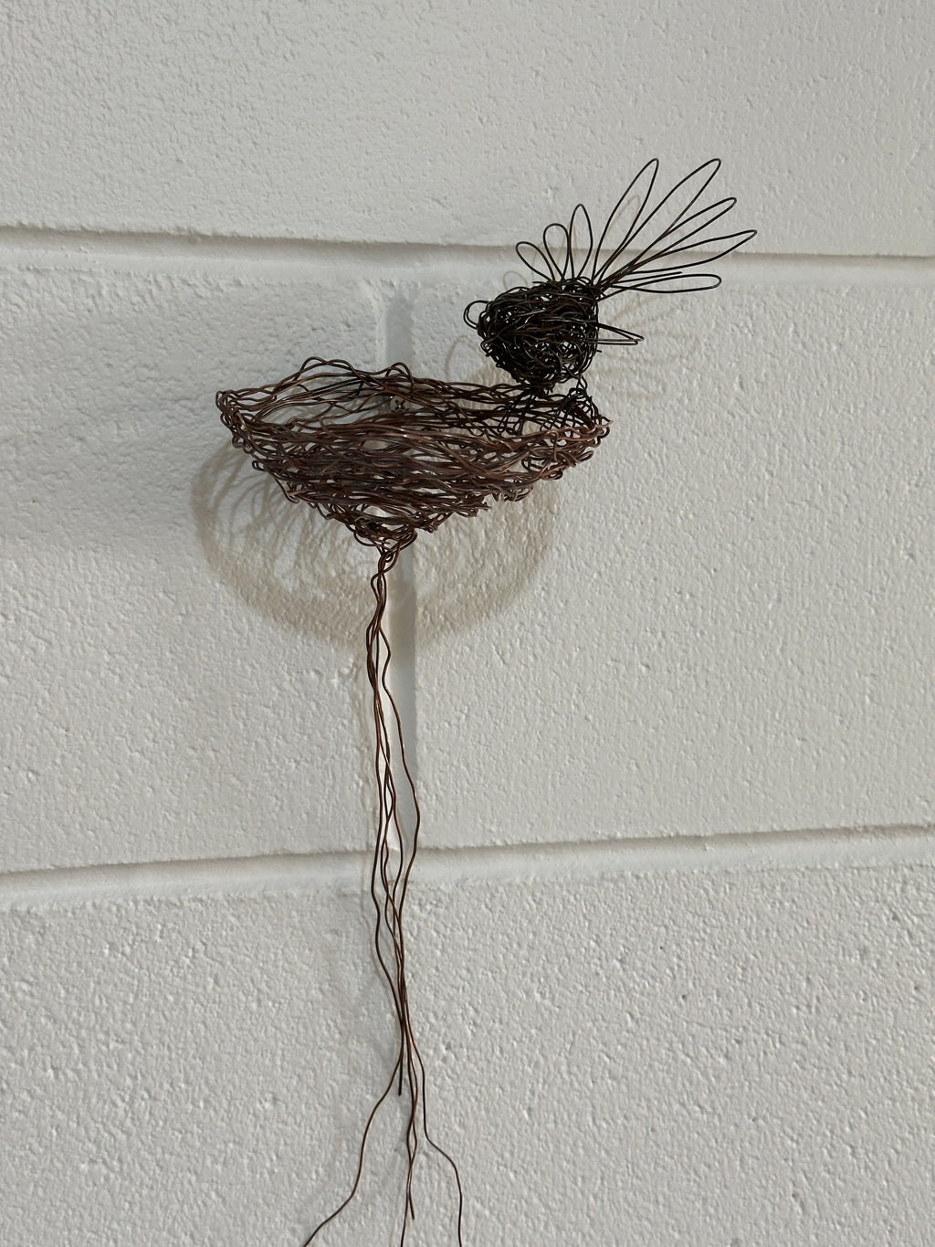 Fantail and nest wall sculpture